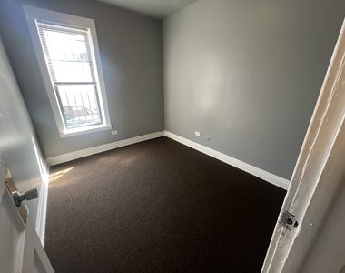 734 E 95th Street - Photo Thumbnail 2