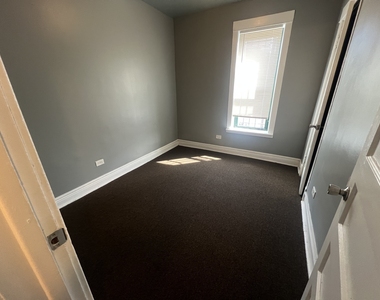 734 E 95th Street - Photo Thumbnail 3