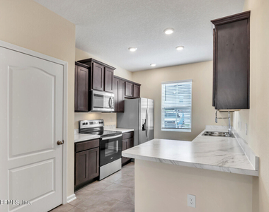 448 Running Woods Street - Photo Thumbnail 2