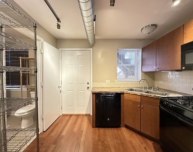 674 N Orleans Street - Photo Thumbnail 3