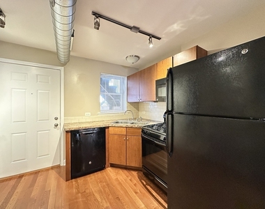674 N Orleans Street - Photo Thumbnail 2