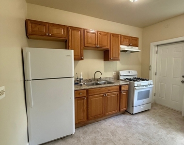 715 W 57th Street - Photo Thumbnail 9