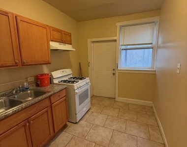715 W 57th Street - Photo Thumbnail 5