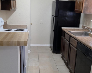 11549 S Kirkwood Road - Photo Thumbnail 2
