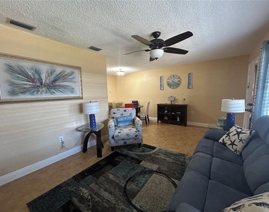 10037 62nd Terrace N - Photo Thumbnail 2