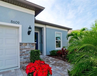 8609 Seascape Cove - Photo Thumbnail 3