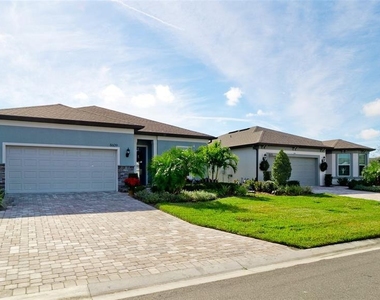 8609 Seascape Cove - Photo Thumbnail 2
