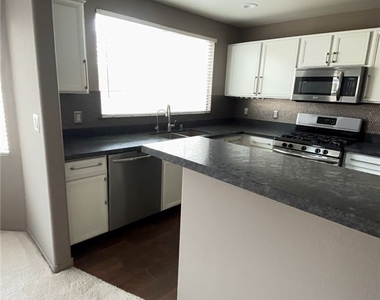 9330 W Maule Avenue - Photo Thumbnail 2