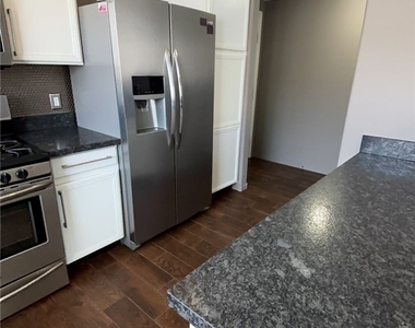 9330 W Maule Avenue - Photo Thumbnail 6