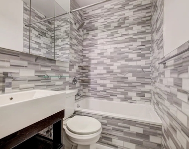 E 105th St - Photo Thumbnail 6