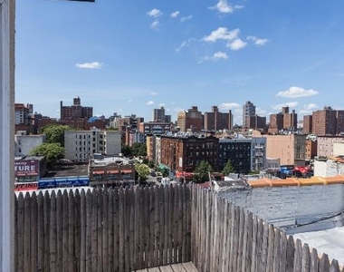 E 105th St - Photo Thumbnail 5