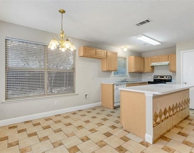8105 Flowertree Drive - Photo Thumbnail 6