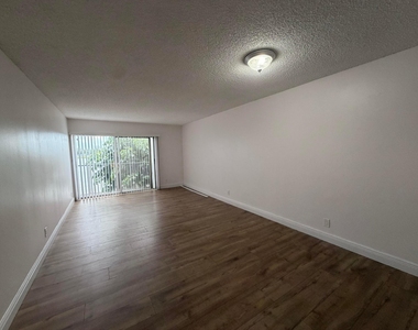 8720 N Sherman Circle - Photo Thumbnail 1