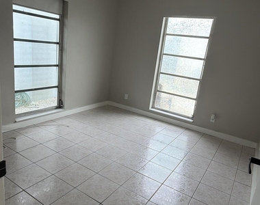 47 Se 13th Street - Photo Thumbnail 1