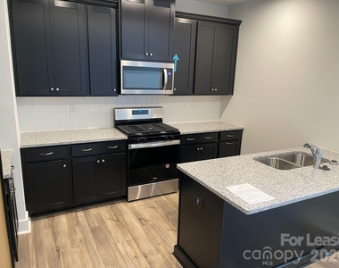 9547 Munsing Drive - Photo Thumbnail 3