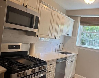 1404 Tuckerman Street Nw - Photo Thumbnail 3