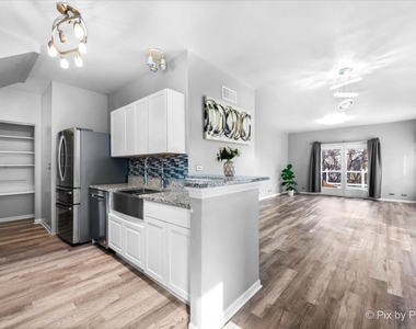 4909 Spencer Avenue - Photo Thumbnail 2
