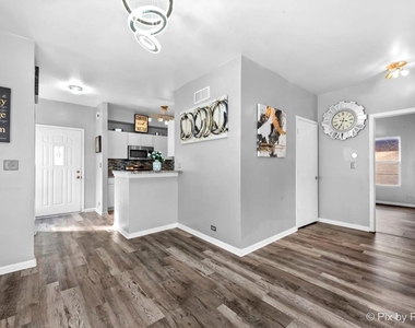 4909 Spencer Avenue - Photo Thumbnail 1