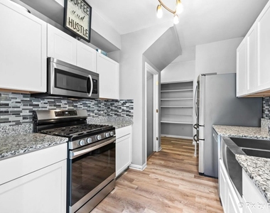 4909 Spencer Avenue - Photo Thumbnail 3