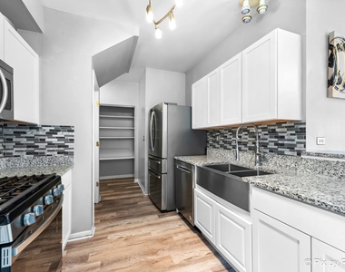 4909 Spencer Avenue - Photo Thumbnail 4