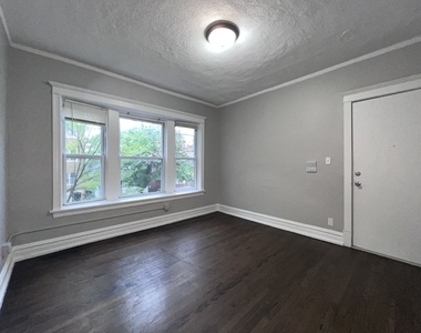 2707 E 78th Street - Photo Thumbnail 3