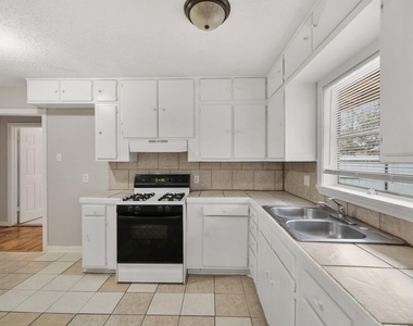8018 Sharondale Drive - Photo Thumbnail 3
