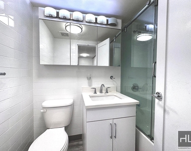 E 16 St - Photo Thumbnail 3