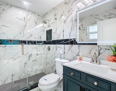 10704 Donbrese Avenue - Photo Thumbnail 19