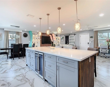 10704 Donbrese Avenue - Photo Thumbnail 10