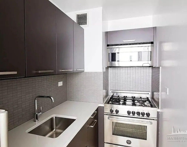 E 39th St - Photo Thumbnail 2