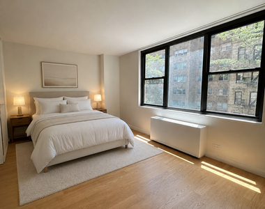 E 49th St - Photo Thumbnail 1