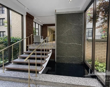 E 49th St - Photo Thumbnail 6