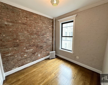 E 6th St. - Photo Thumbnail 1