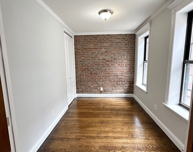 E 6th St. - Photo Thumbnail 4
