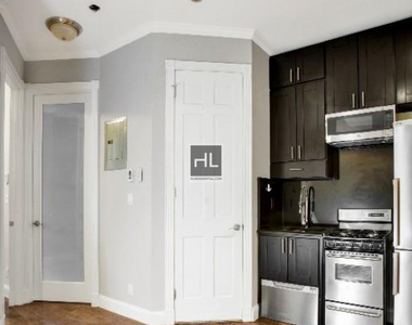E 6th St. - Photo Thumbnail 6