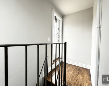 E 13th St. - Photo Thumbnail 2