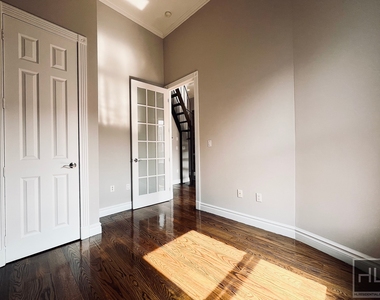 E 13th St. - Photo Thumbnail 5