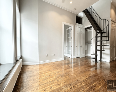 E 13th St. - Photo Thumbnail 1