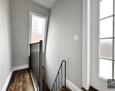 E 13th St. - Photo Thumbnail 3