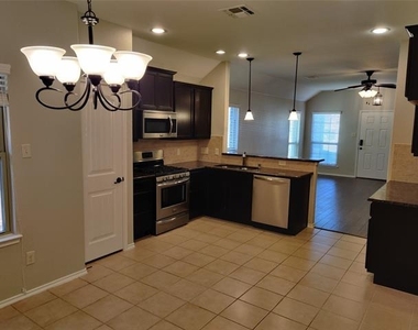 9901 Pronghorn Road - Photo Thumbnail 4