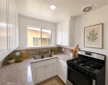 8706 Parthenia Place - Photo Thumbnail 2