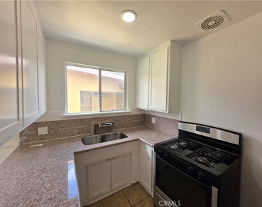 8706 Parthenia Place - Photo Thumbnail 7
