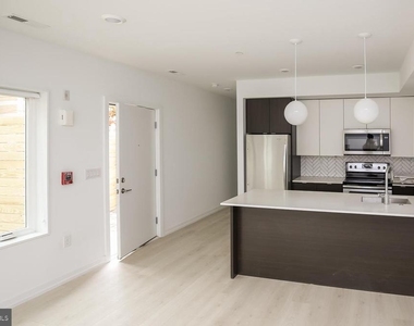 1250 N Taney - Photo Thumbnail 2