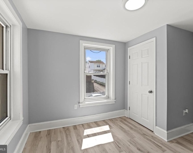 106 W 5th Street - Photo Thumbnail 16