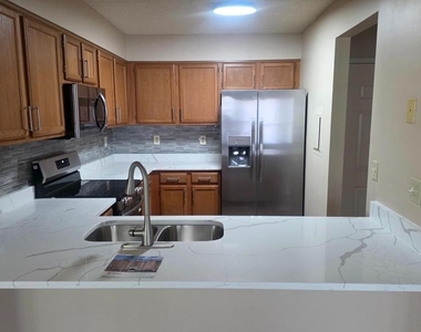 7317 Eden Brook Drive - Photo Thumbnail 7