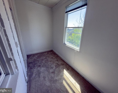 513 E 41st Street E - Photo Thumbnail 12