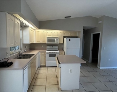 10738 Cocoatree Court - Photo Thumbnail 3