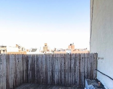 E 5th St. - Photo Thumbnail 3