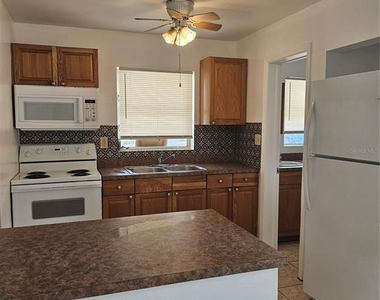8775 58th Street N - Photo Thumbnail 3