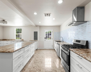1903 Pinewoods Way - Photo Thumbnail 3